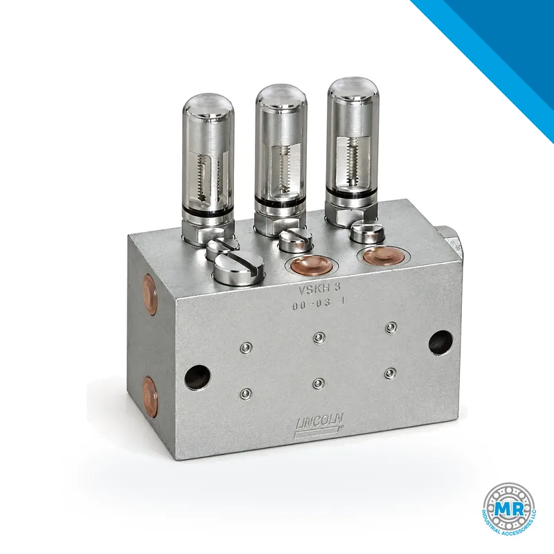Steel metering block with threaded outlets and cylindrical body for centralized lubrication system · SKF LL/620-40064-3