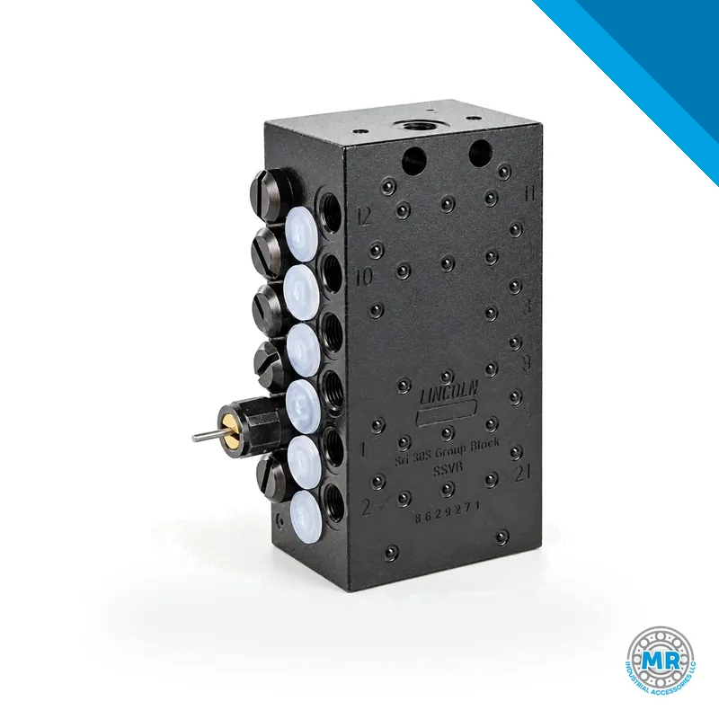 Stainless steel metering device with prismatic body and several outlets for lubricant · SKF LL/649-29508-1