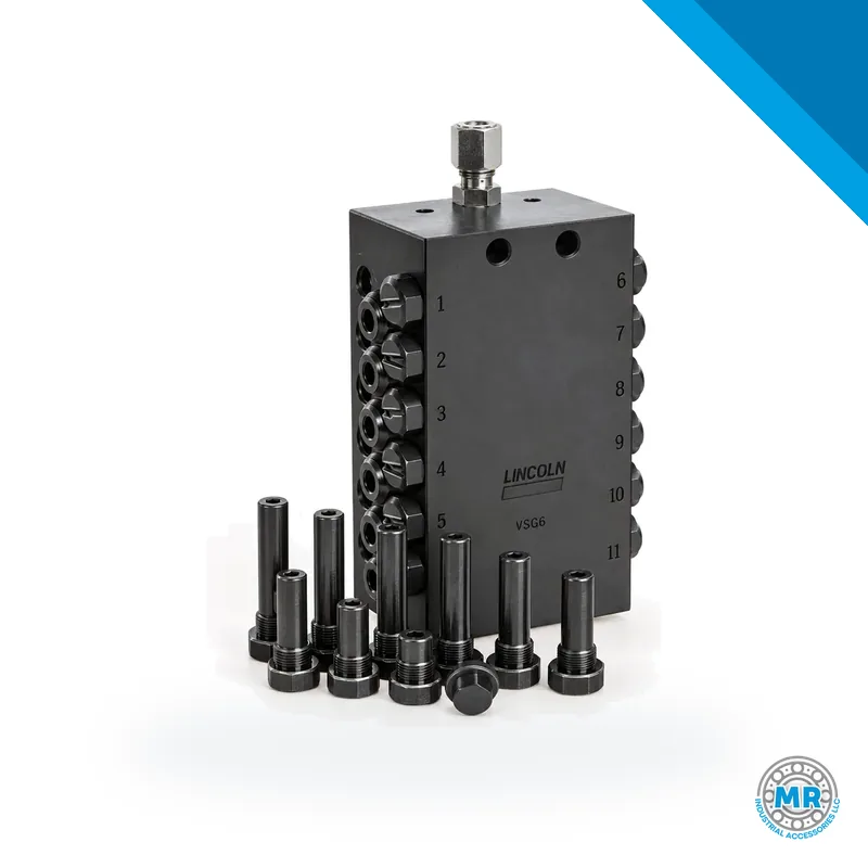 Steel SSV-D divider valve with threaded outlets and elongated body · SKF LL/649-29545-1