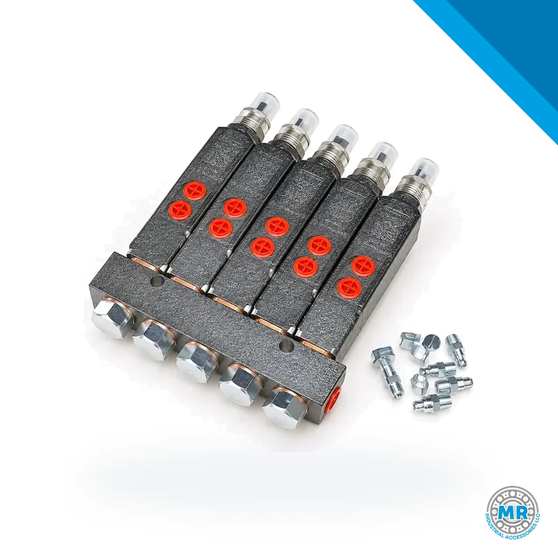 Grease manifold with five cylindrical injectors mounted on a steel block · SKF LL/85770-5