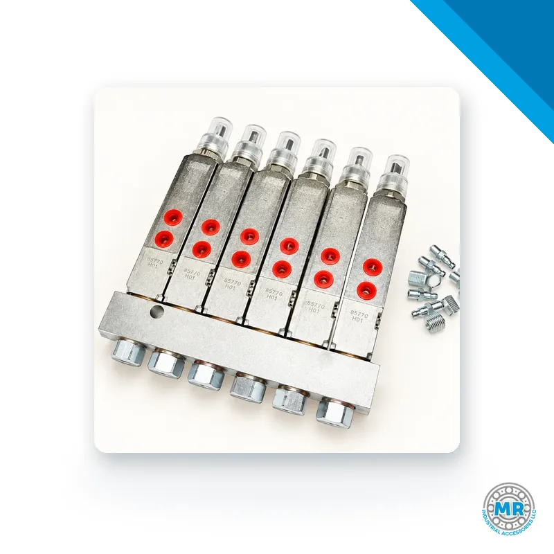 Grease manifold distributor with six injectors on a rectangular steel block · SKF LL/85770-6