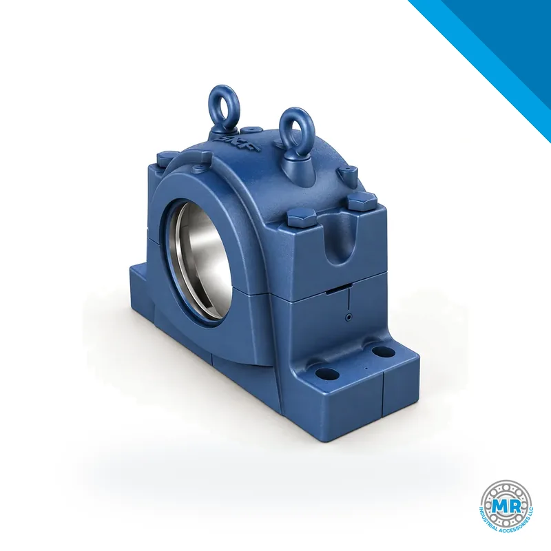 Split gray cast iron plummer block housing with two halves and mounting holes · SKF SNL 3136